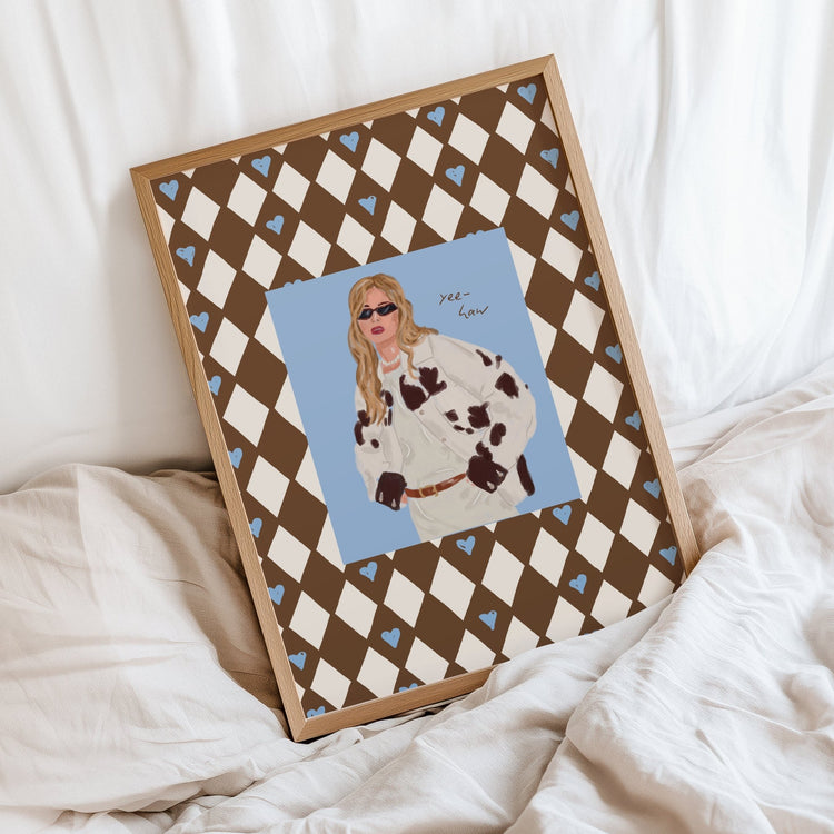 Yeehaw Cowgirl wall art displayed in a stylish bedroom interior