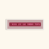 Common People Framed Panoramic Print featuring music-inspired typography wall art in a white frame