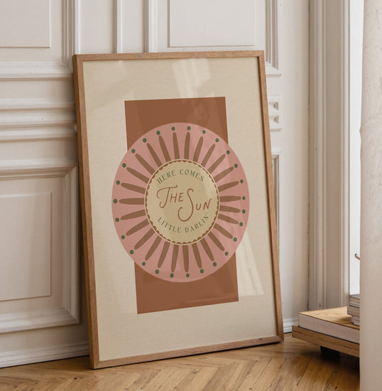 Retro-inspired Here Comes the Sun Little Darlin' typography art print in a vibrant sunshine yellow palette, perfect for the 2026 dopamine decor and warm minimalism interior trends.