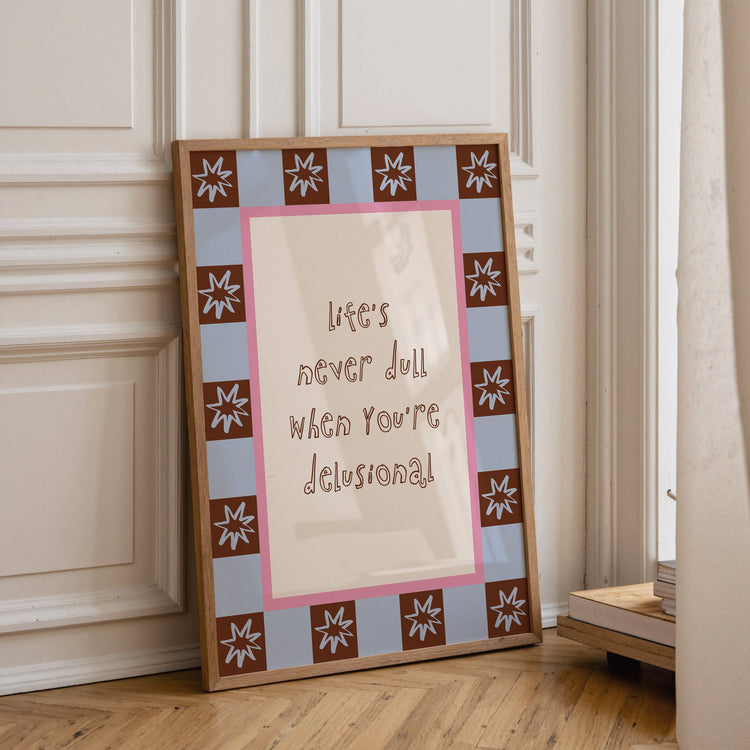 Life's Never Dull Quote Print displayed in a modern home interior gallery wall