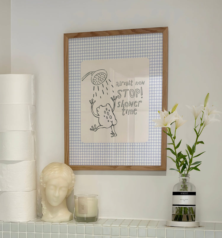 Stop Shower Time quote print displayed in a stylish contemporary bathroom